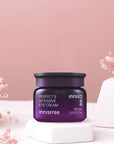 picture of 30 ml innisfree perfect 9 intensive eye cream on a pink background with pink flowers